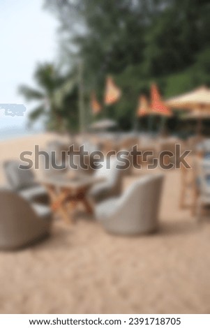 Blurred background of outdoor cafe on the beach. Blurred background.
