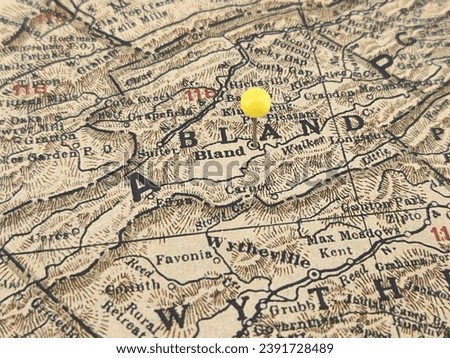 Bland County, Virginia vintage map marked by a yellow tack. The county seat is located in Bland, VA. Royalty-Free Stock Photo #2391728489