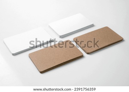 Stack of business cards on a white background. Empty business card for copy space