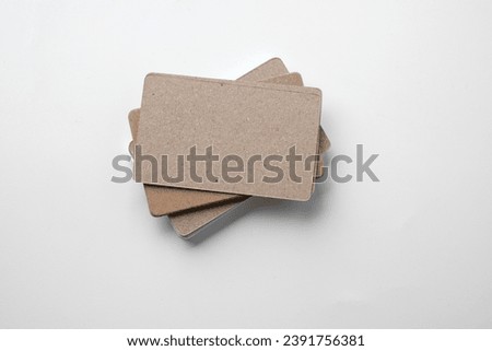Stack of business cards on a white background. Empty business card for copy space
