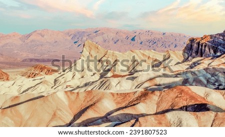 Zabriskie Point is a part of Amargosa Range located east of Death Valley in, Death Valley National Park in California Royalty-Free Stock Photo #2391807523