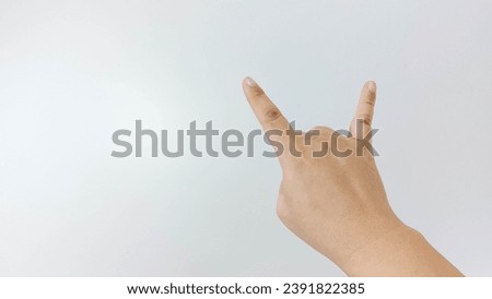 Hand gesture close up, rock and roll sign. Isolated on white background