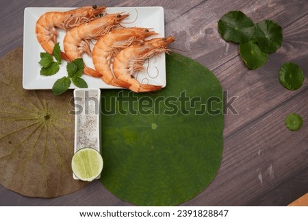 Steamed shrimps with coconut juice on the table 