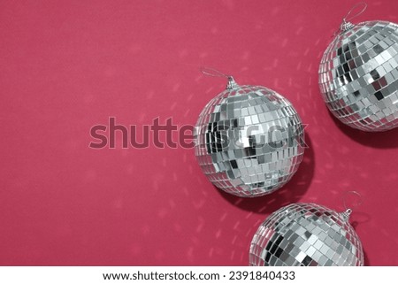 Beautiful disco balls on a red background