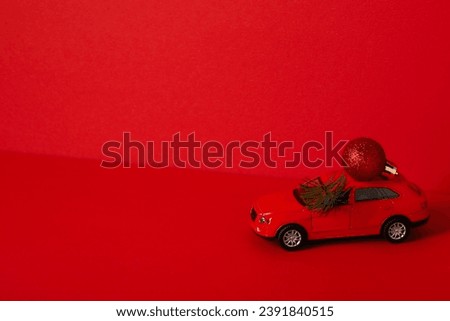 A car with a Christmas tree and New Year's decor.