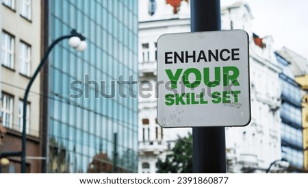 Enhance your skill set written on a sign in front of office buildings