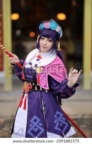 Portrait of a beautiful young woman game Cosplay with Chinese dress