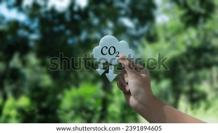 Co2 cloud, Concept of Reduce Carbon dioxide emission and pollution. Sustainable development, renewable energy. Greenhouse gas control. Royalty-Free Stock Photo #2391894605