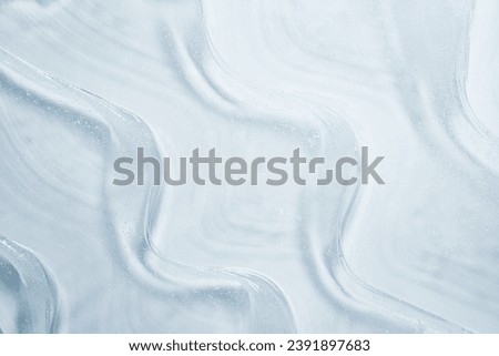 Liquid water gel smudge cosmetic blue textured background