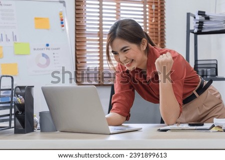 Excited female feeling euphoric celebrating online win success achievement result, young woman happy about good email news, motivated by great offer or new opportunity, passed exam, got a job Royalty-Free Stock Photo #2391899613