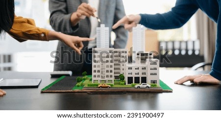 Customers who choose to buy a condominium room and a bank approve a loan for their purchase. Condominium and house loan interest rate from bank concept in office
 Royalty-Free Stock Photo #2391900497