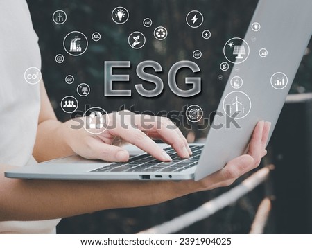 ESG environmental concepts, use of environmentally friendly renewable energy Young woman working on laptop using technology to help develop good energy for the planet.