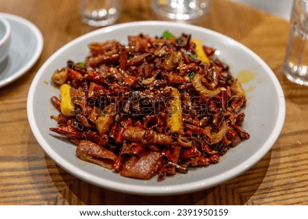 Sizzling Dry Pot Style Pork Intestine, Richly Seasoned with Sichuan Peppercorns and Chilies