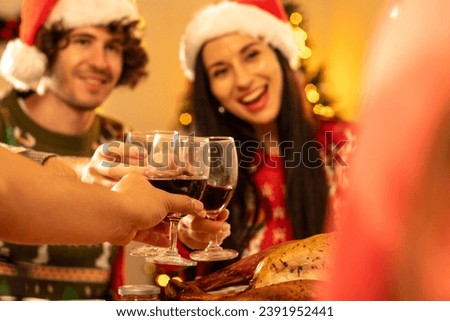 People and holidays concept - Happy family celebrate christmas party over christmas tree on background at home. Lovely family with decorative colorful christmas balls on pine tree on bokeh background.