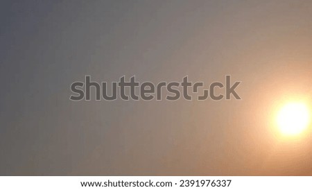Stunning Sunset Overlooking Serene Landscape - Creative and Beautiful View Stock Photo best for your Sunset Collection.