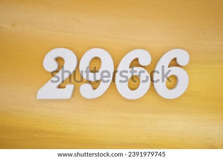 The golden yellow painted wood panel for the background, number 2966, is made from white painted wood.
