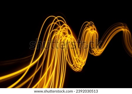 Abstract modern banner design. Glowing warm lines on black background. High quality photo