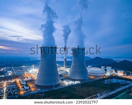 Night view of cooling tower of thermal power plant Royalty-Free Stock Photo #2392032797