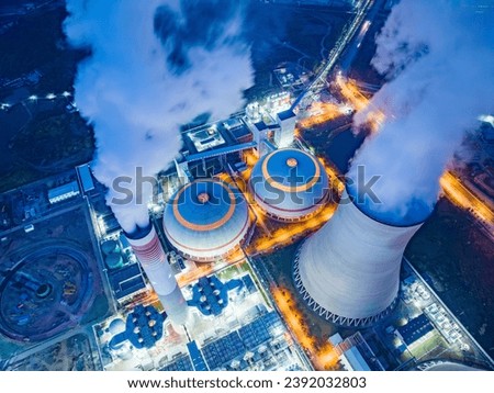 Night view of cooling tower of thermal power plant Royalty-Free Stock Photo #2392032803