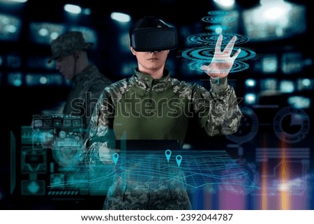 Military Think Tank, AI technology in the army. Warfare analytic operator checking coordination of the military team. Military commander with a digital device with augmented reality operating troops. Royalty-Free Stock Photo #2392044787
