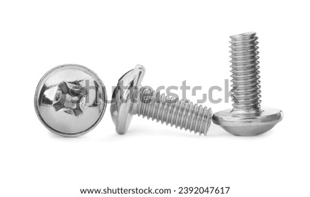 Three metal truss head screws isolated on white Royalty-Free Stock Photo #2392047617