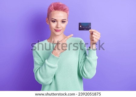Photo of nice lovely lady direct finger arm hold demonstrate plastic debit card isolated on violet color background