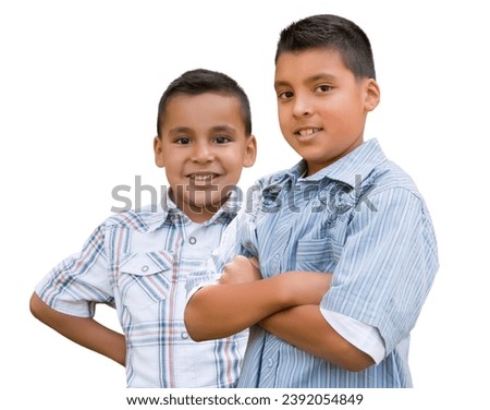 Two Happy Young Hispanic School Boys Isolated on White. Royalty-Free Stock Photo #2392054849