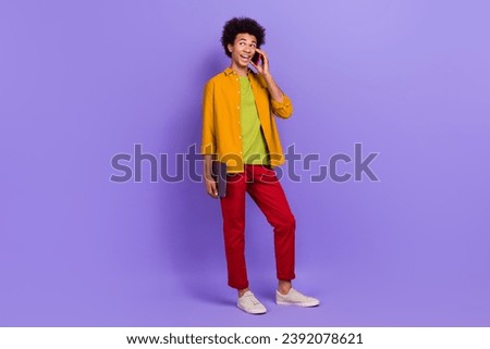 Full length photo of nice successful man wear trendy clothes speaking talking looking empty space isolated on purple color background