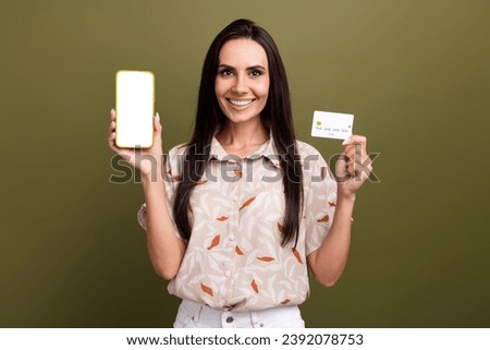 Photo of young business lady demonstrate her cashless transaction in smartphone tax free money transfer isolated on khaki color background