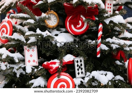 Christmas tree with gifts decorated for new year with lights garland