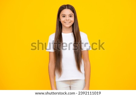 Pretty teenage girl in studio. Child girl portrait. Happy teenager portrait. Smiling girl.