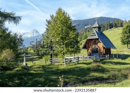 Chapel of the Queen Mary of Peace on the Uskovnica mountain meadow on Pokljuka Royalty-Free Stock Photo #2392135887