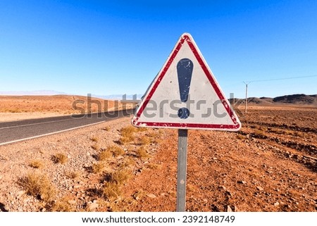 Triangle Danger Sign, Exclamation Mark Road Sign, Danger Traffic Sign in Desert