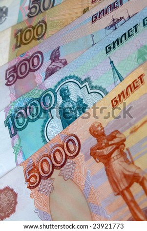 Russian money of different denomination, photographed close-up.