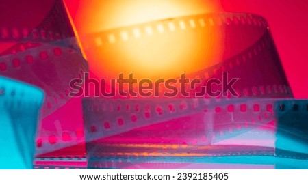 color cinematographic background with film strip. premiere show business film production announcement