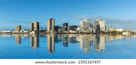 scenic view to New Orleans skyline in morning light from river Mississippi, Louisiana, USA