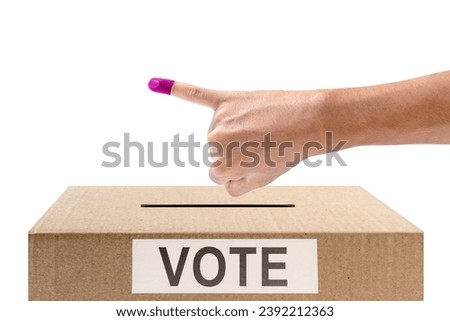 Human hand gesture after inserting vote paper into ballot box isolated over white background. Election concept