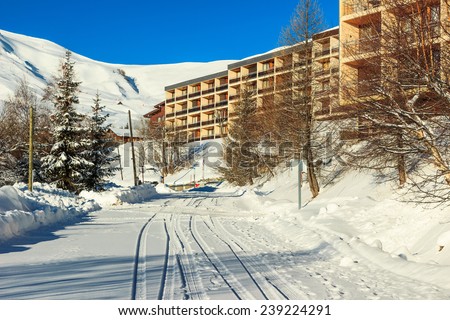 Winter cityscape and famous ski resort in the Alps,La Toussuire,France,Europe Royalty-Free Stock Photo #239224291