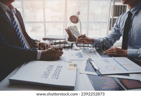 Asian business advisory meeting To analyze and plan the situation in financial reports. Company budget in the conference room investment consultant financial advisor and accounting concepts.