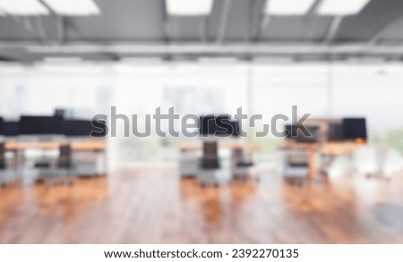 Defocused office background of a Board room with rustic wooden flooring