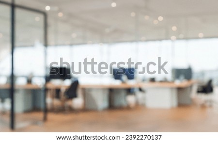 Defocused office background of a Board room with rustic wooden flooring Royalty-Free Stock Photo #2392270137