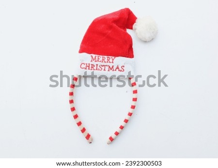 Beautiful headband 
 Decorative red Santa Hat isolate on a white backdrop.
concept of joyful Christmas party,New year is coming soon, festive season decoration with Christmas elements