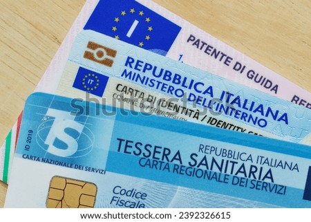 Close-up of italian driving licence card, identity card and health insurance card Royalty-Free Stock Photo #2392326615