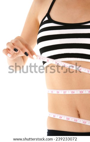 Portrait of beautiful woman holding measurement tape on white background. slim her body 