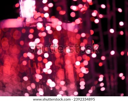 Red-pink bokeh for new year or party background.