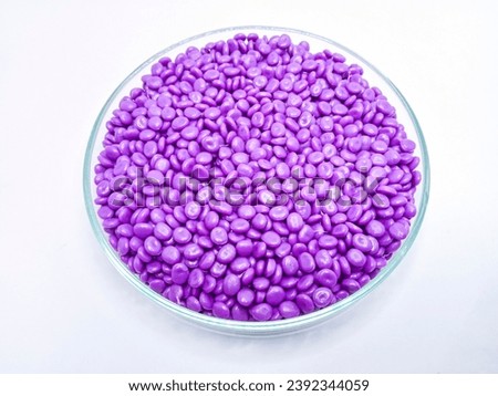Polymer masterbatch granules isolated on a white background are suitable for plastic company profile photo catalog banner designs