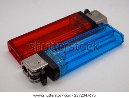 The lighters are red and blue on a white background
