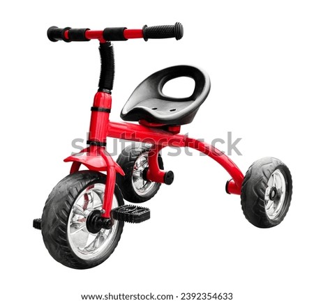 Red three wheel bicycle isolated on white background with clipping path