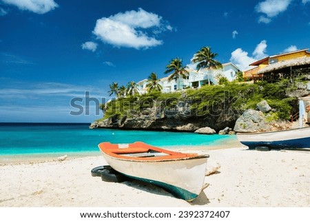 Playa Lagun Beach Cliff Curacao, Lagun Beach Curacao a small island in the Caribbean. white tropical beach in Curacao Royalty-Free Stock Photo #2392372407