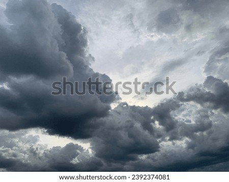 Blue sky and beautiful gray cumulonimbus clouds and heavy rain.